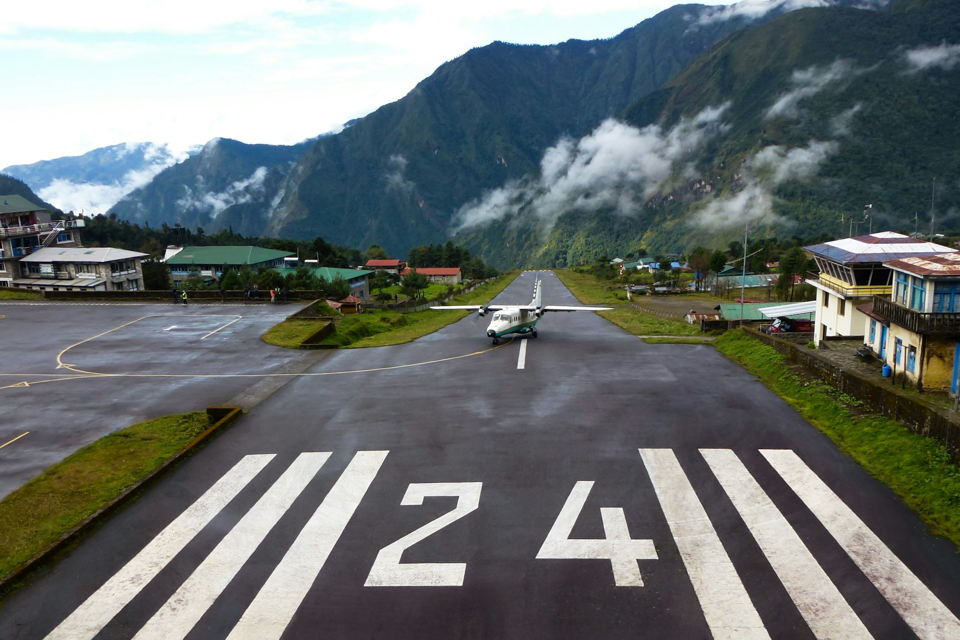 Small plane landing at the "Tenzing-Hillary" Airport in Lukla, Everest Base Camp trek, Nepal