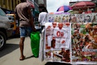 Roadside selling of motion picture by the Nigerian film industry called Nollywood on DVD.