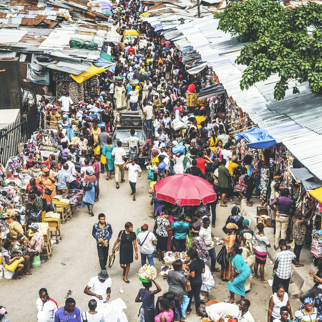 Street market crowd at Lagos Island's commercial district.