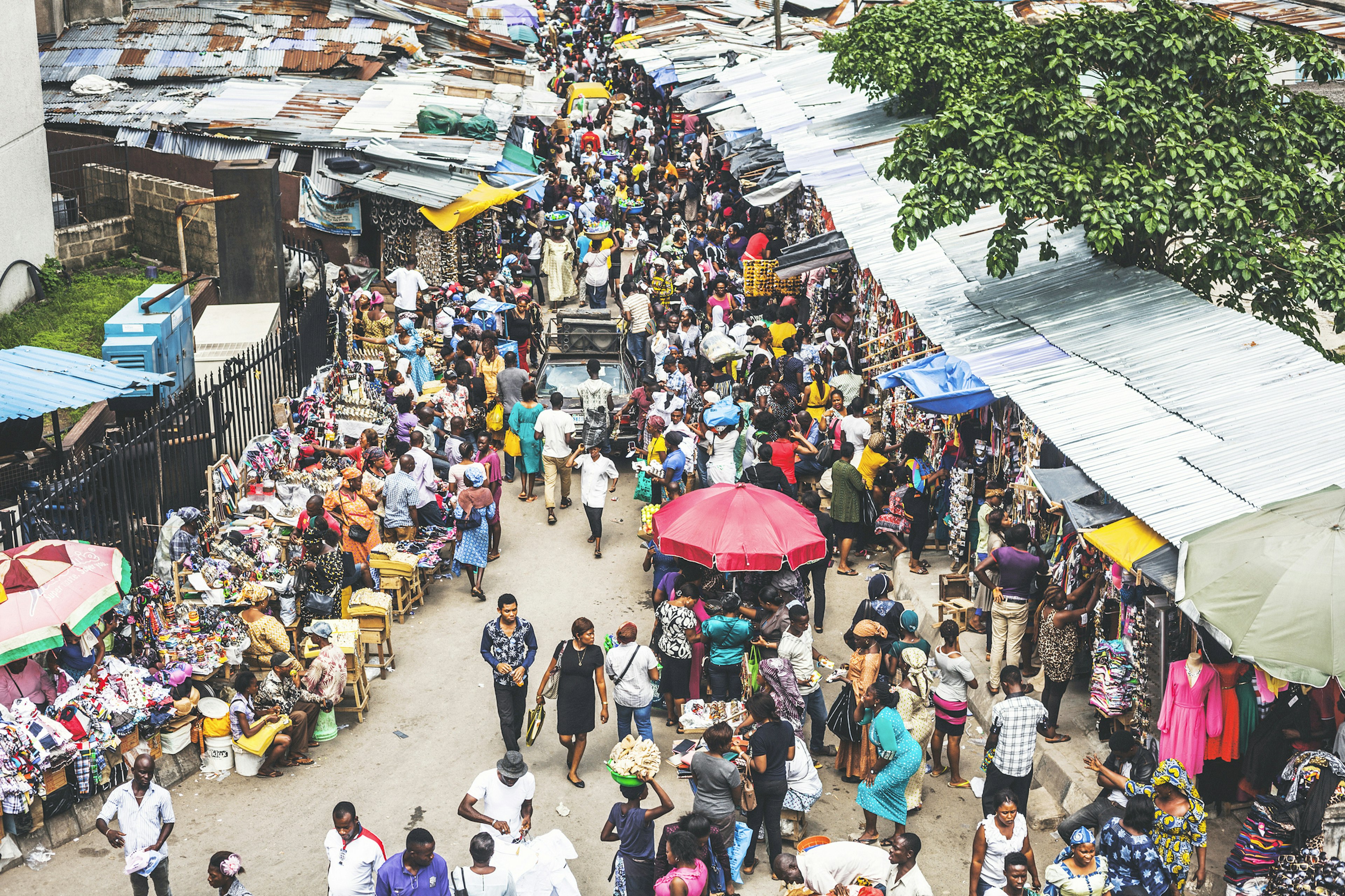 Street market crowd at Lagos Island's commercial district.