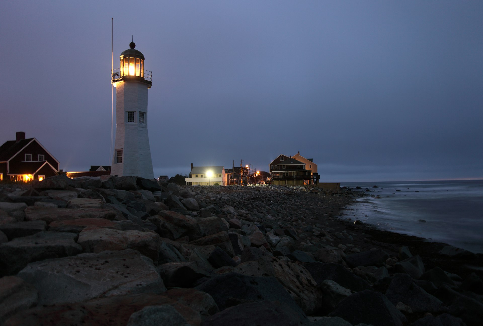 Historic Scituate Lighthouse on the Massachusetts coast at night.