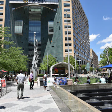 JUNE 30, 2019: Pedestrians walking around Campus Martius park.