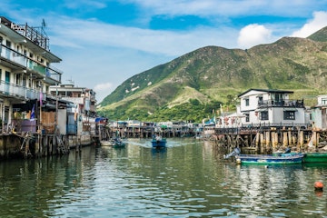 Tai O, Hong Kong, China- June 10, 2014: stilt houses and fishermen motorboats in Lantau island
