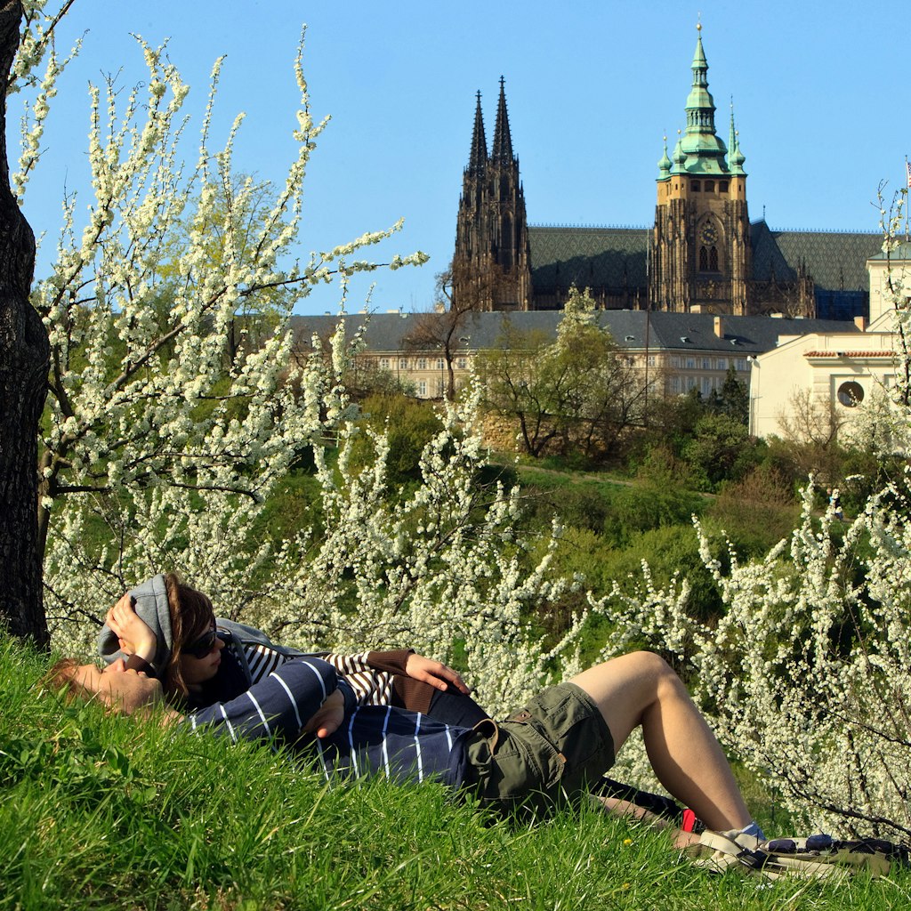 PRAGUE, CZECH REPUBLIC, April 10. 2011: People enjoying sunny weather, spring and blooming trees at Petrin hill on April 10. 2011 in Prague, Czech Republic
