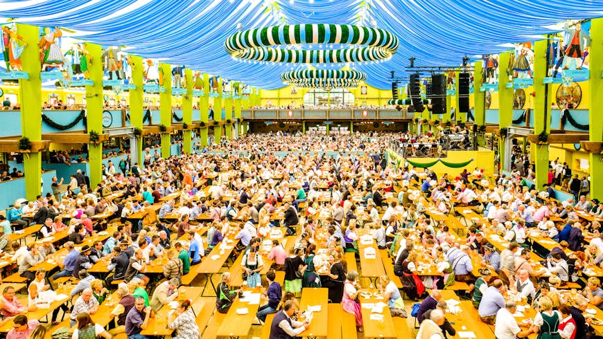 People in the "Spaten"-beer tent at the Oktoberfest in Munich