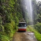Bus at the Death Road - the most dangerous road in the world, North Yungas, Bolivia. - stock photo