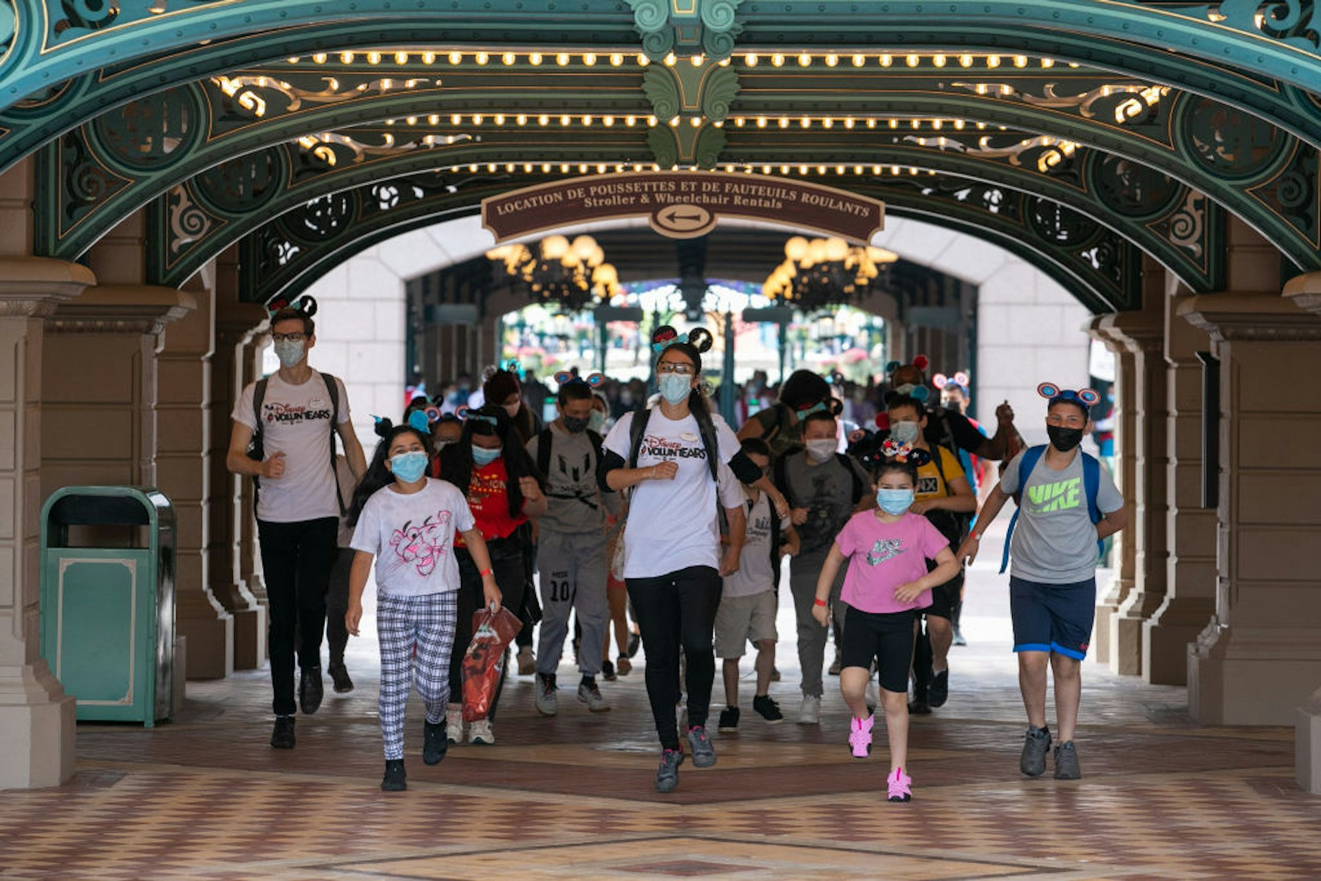 Visitors enter the gates at Disneyland Paris
