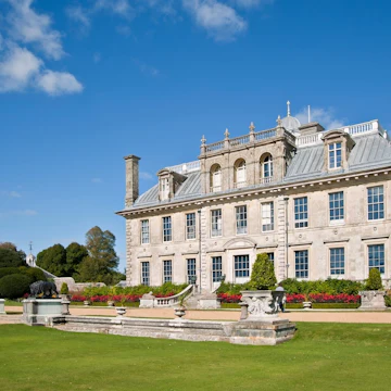 KINGSTON LACY, UK - SEPTEMBER 29, 2012: A view toward the country house at Kingston Lacy with landscaped gardens in Summer; Shutterstock ID 1033498075; your: Bridget Brown; gl: 65050; netsuite: Online Editorial; full: POI Image Update
