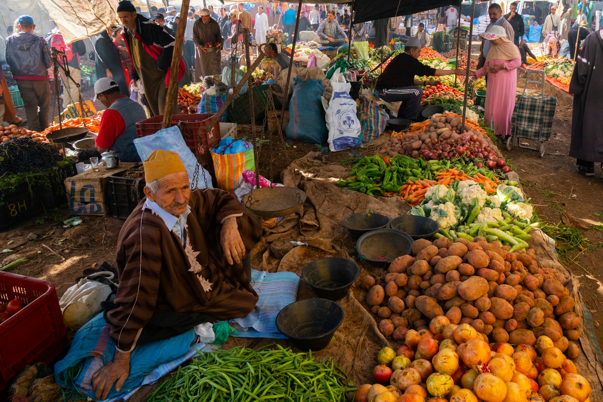 Vegetable seller at the the Saturday weekly market, Asni, High Atlas, Morocco
