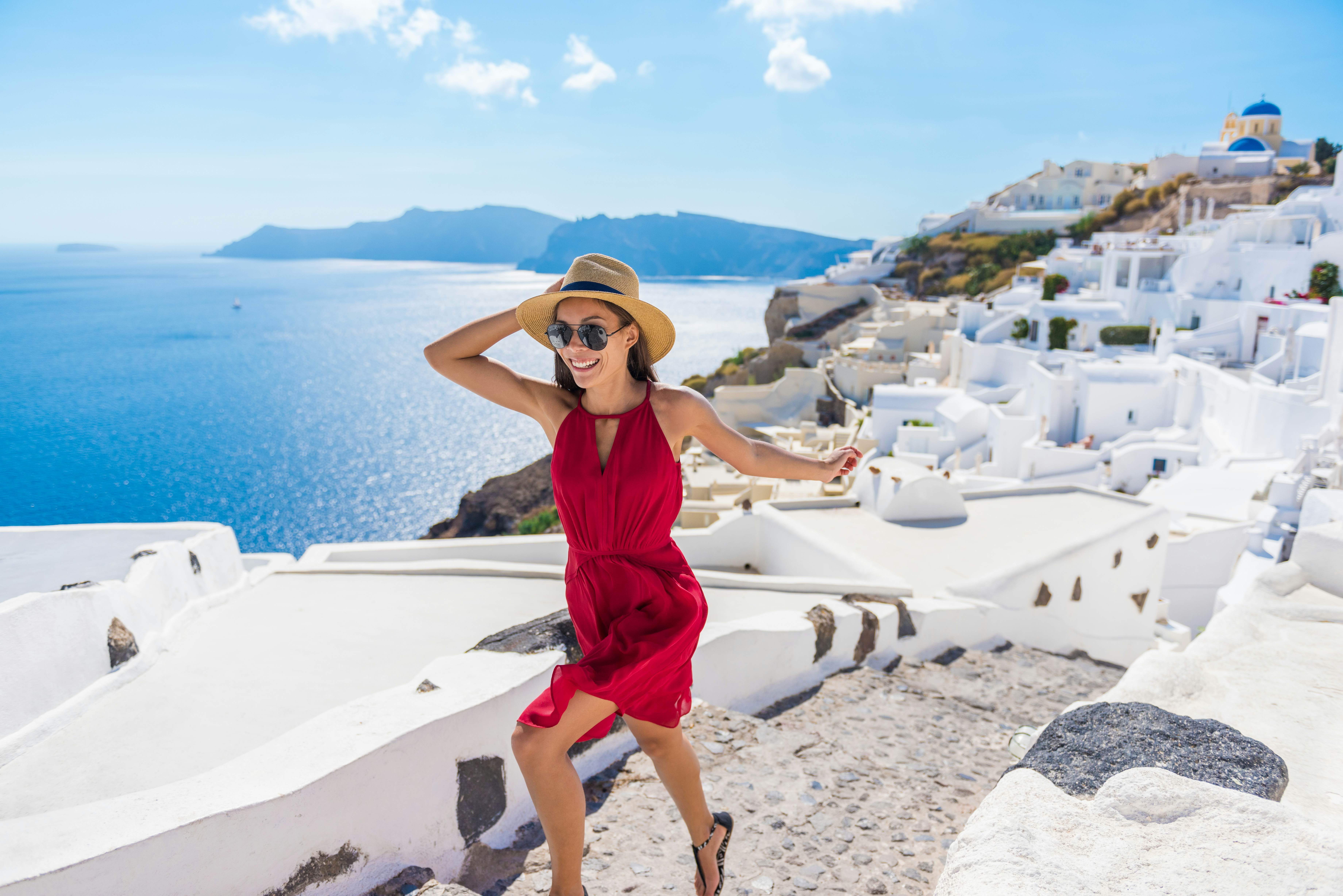 Woman Running Stairs Santorini, Greek Islands, Greece, Europe