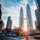 Sunset through the Petronas Towers in Kuala Lumpur, Malaysia