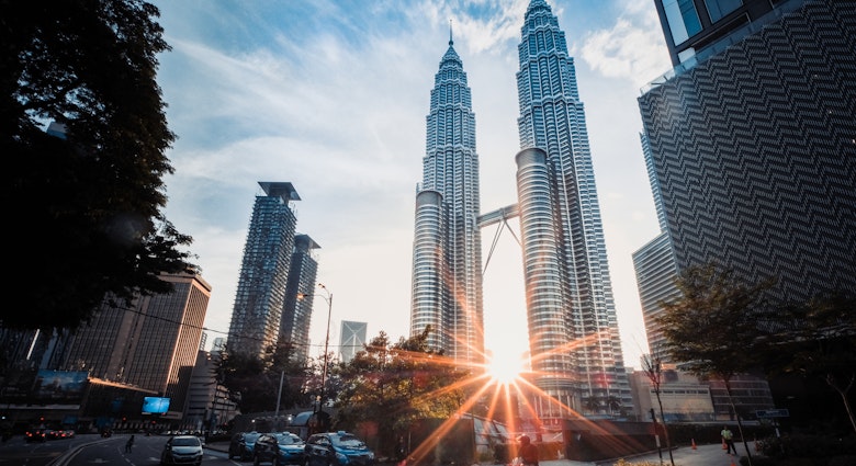 Sunset through the Petronas Towers in Kuala Lumpur, Malaysia
