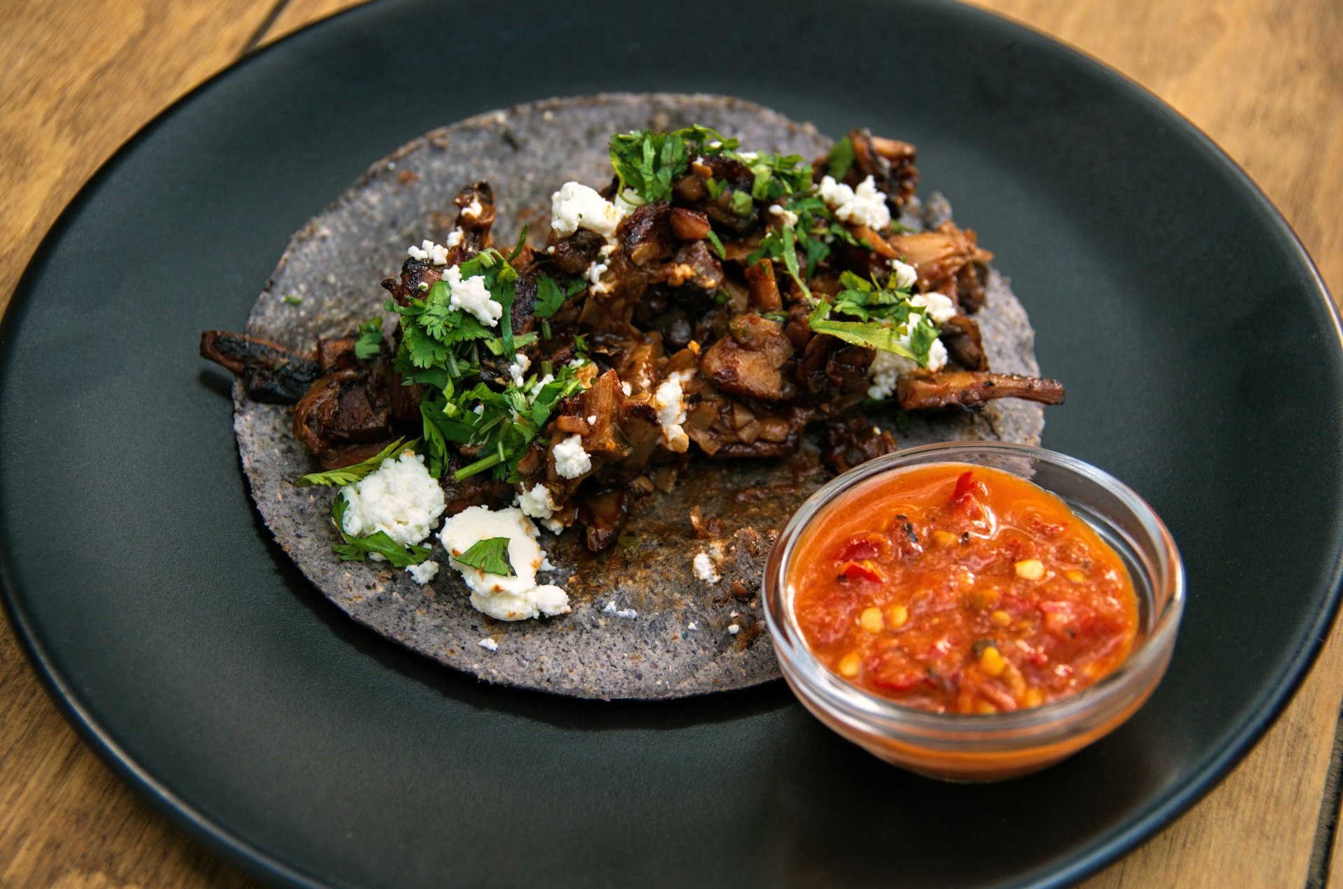 Vegetarian tacos with goats cheese and mushrooms