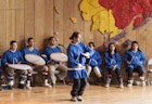 ANCHORAGE, ALASKA, UNITED STATES - 2009/06/18: Native Alaskan youth demonstrates the traditional dance of her culture at the Native Alaskan Heritage Center. (Photo by John Greim/LightRocket via Getty Images)