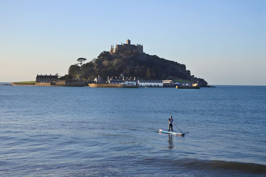 Paddleboarder in Front of St. Michael's Mount, Cornwall.