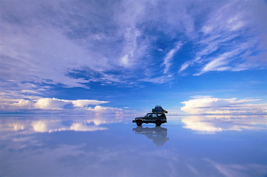 Otherworldly reflections on the salt flats of Salar de Uyuni Four wheel drive in Salar de Uyuni