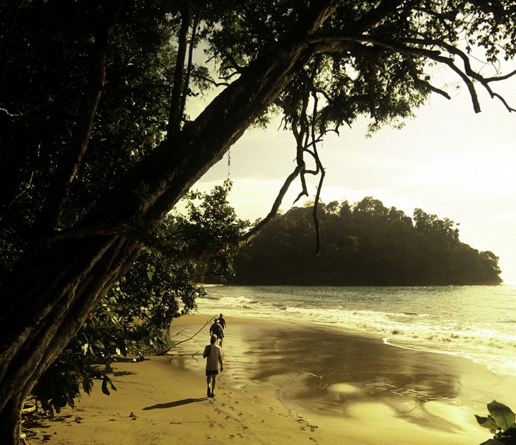 Costa Rica, Puntarenas, afternoon beach hiking in Manuel Antonio National Park.