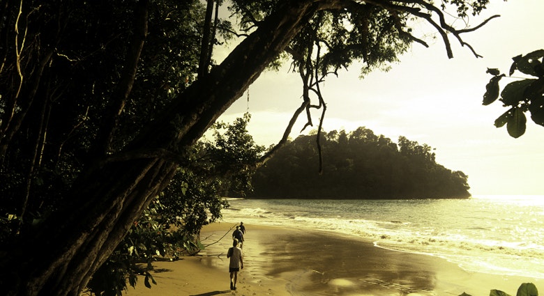 Costa Rica, Puntarenas, afternoon beach hiking in Manuel Antonio National Park.