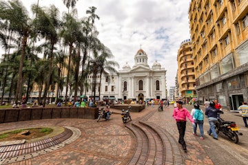 People walk through the Plaza de Caicedo, the primary plaza in Cali, Colombia on June 10, 2016.