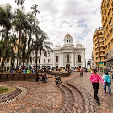 People walk through the Plaza de Caicedo, the primary plaza in Cali, Colombia on June 10, 2016.