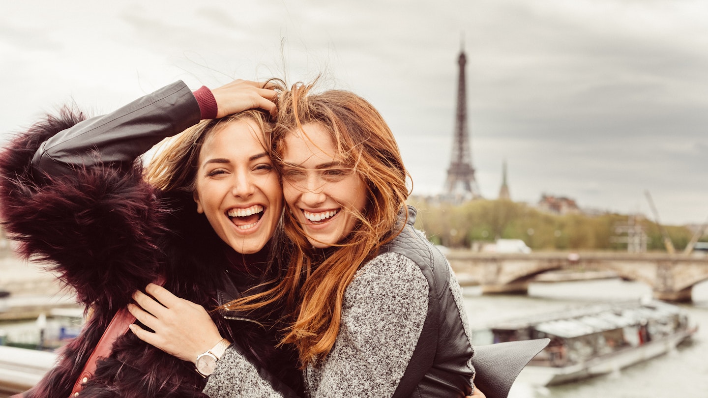 Happy girls on a vacation in Paris