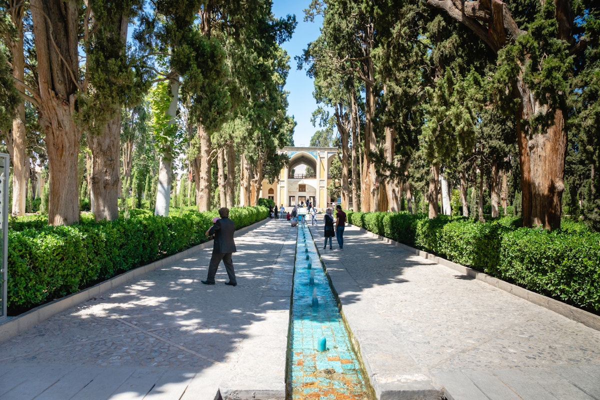 Kashan, Iran - June 2018: Fin Garden in Kashan, Iran  and visitors - Fin Garden is one of the most famous royal gardens in Iran.