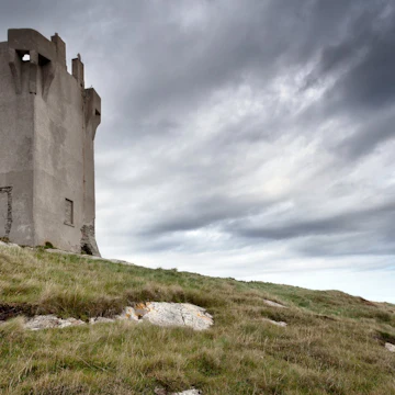 Malin Head is located on the Inishowen Peninsula, County Donegal, Ireland and is the most northerly point of the island of Ireland. A military watchtower was built at Banba's Crown in 1805, during the Napoleonic Wars. Around 1902, a signal station was also built at Banba's Crown, quite close to the old Napoleonic watchtower. Both of these buildings still stand.