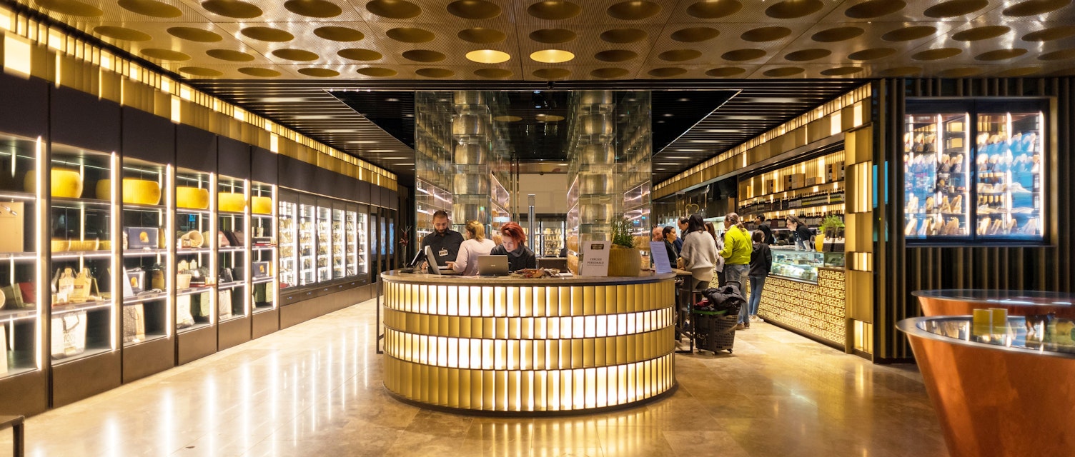 BOLOGNA, ITALY - CIRCA DECEMBER, 2017: Parmiggiano Reggiano store inside Fico Eataly World, located in Bologna, is the largest agrofood park in the world. Internal view.; Shutterstock ID 768732697; your: Bridget Brown; gl: 65050; netsuite: Online Editorial; full: POI Image Update