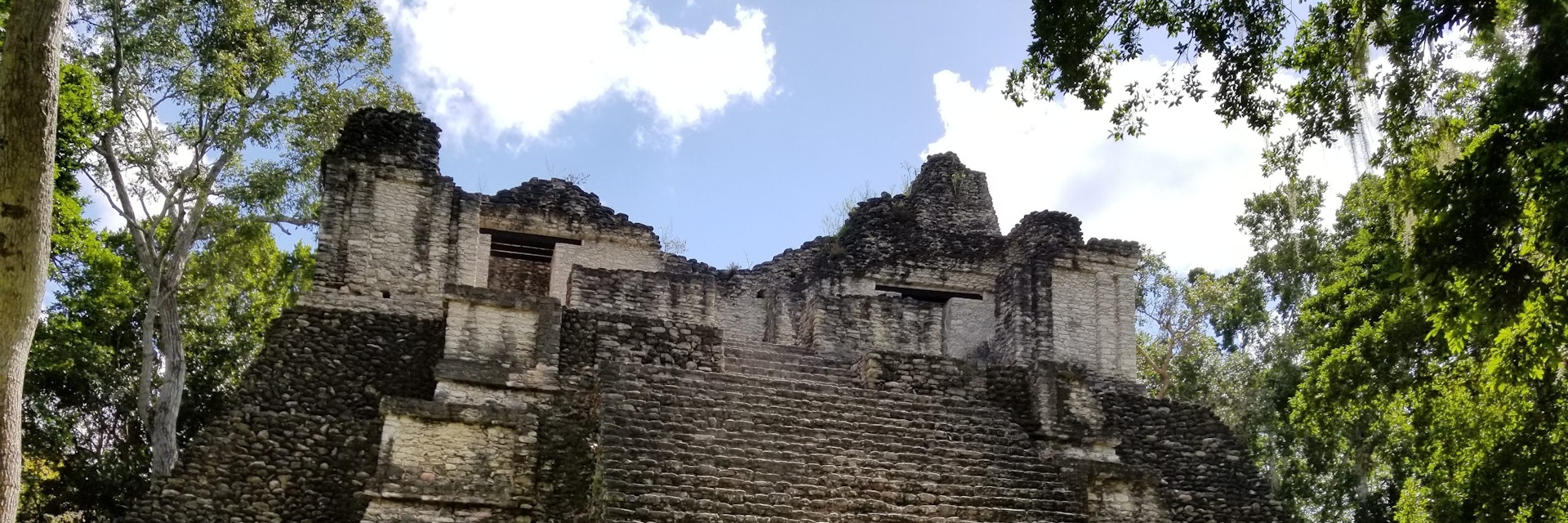 This is one of the well preserved ancient Mayan temples at the Dzibanche's archeological Mayan ruins site about two hours inland in the Yucatan region of Mexico. They still allow visitors to climb to the top of the temples but may need to restrict it in the future due to the expansion of tourism in the area.
Dzibanche
