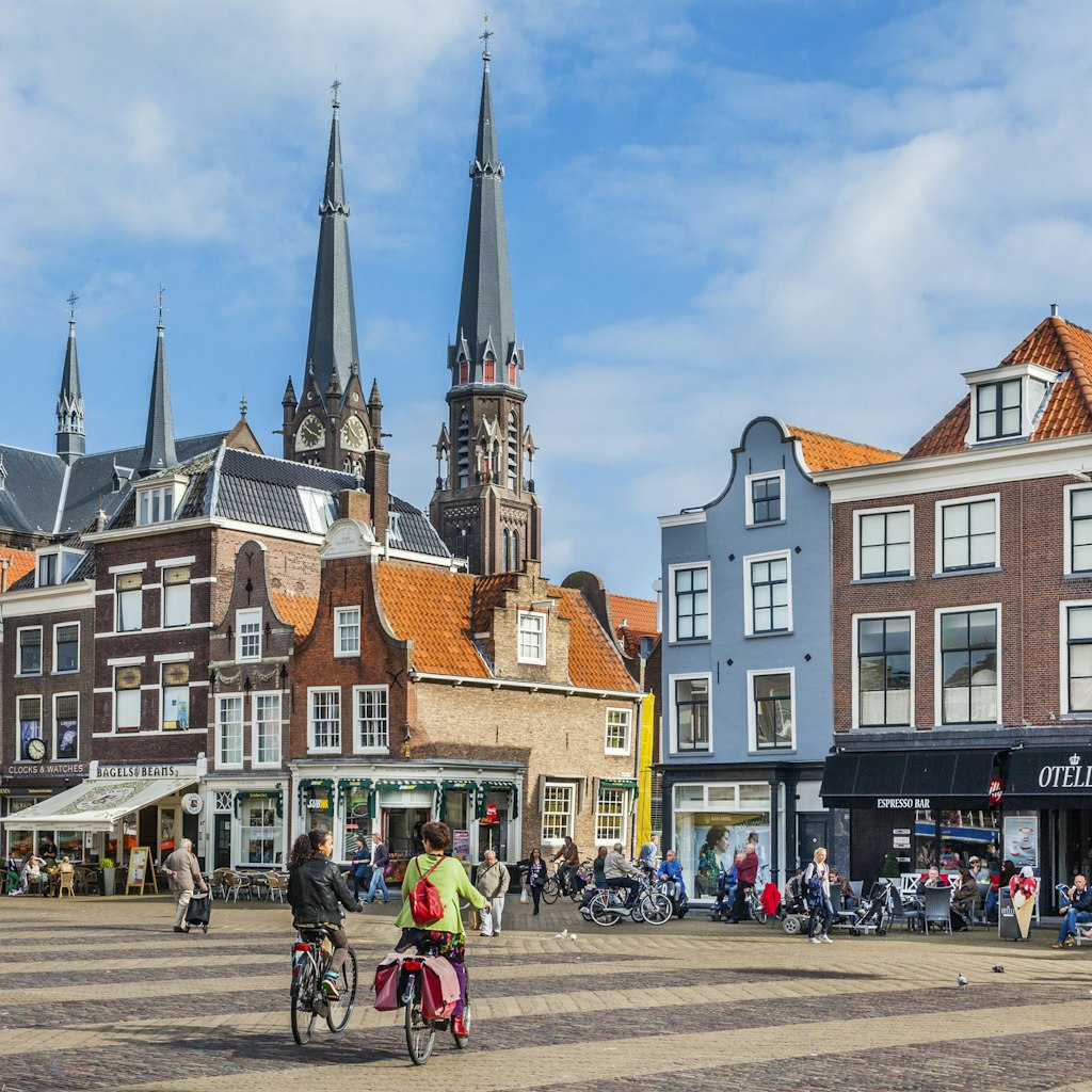 Netherlands, South Holland, Delft, Markt, view of the market square with the spires of Maria van Jesse Church in the background