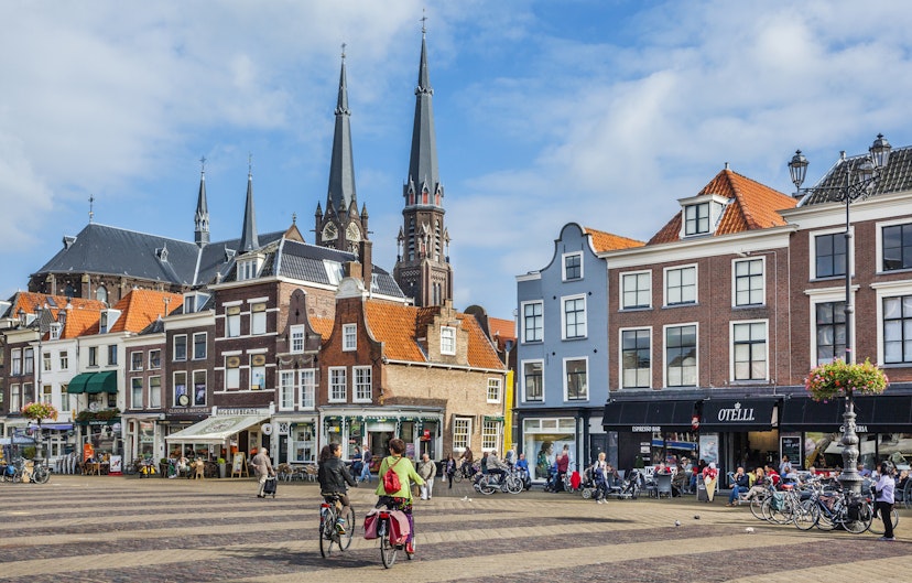 Netherlands, South Holland, Delft, Markt, view of the market square with the spires of Maria van Jesse Church in the background