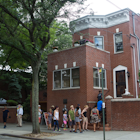 Visitors enter the Louis Armstrong House Museum