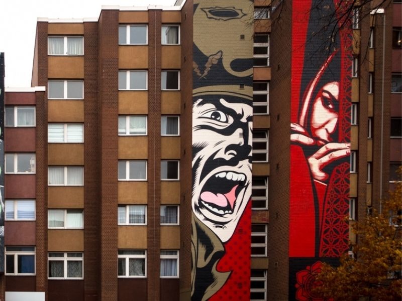 Two artworks by Shepard Fairey along Bülowstrasse in Berlin