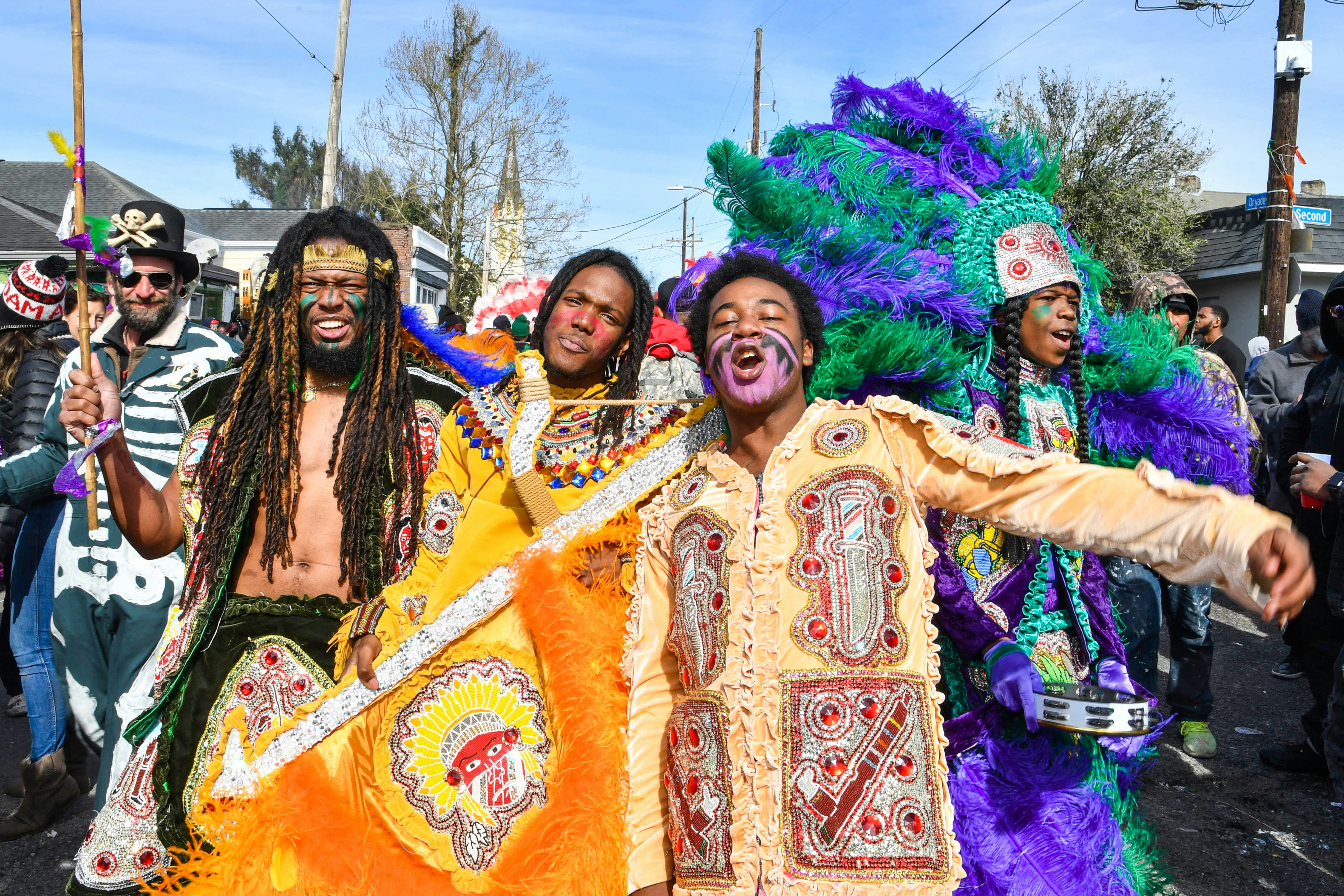 NEW ORLEANS, LOUISIANA - MARCH 05: (L-R) Lawrence Boudreaux, Marwan Pleasant, Jwan Boudreaux,  and Nigel Pleasant of the Golden Eagles Mardi Gras Indians face off with another tribe on March 5, 2019 in New Orleans, Louisiana. (Photo by Erika Goldring/Getty Images)