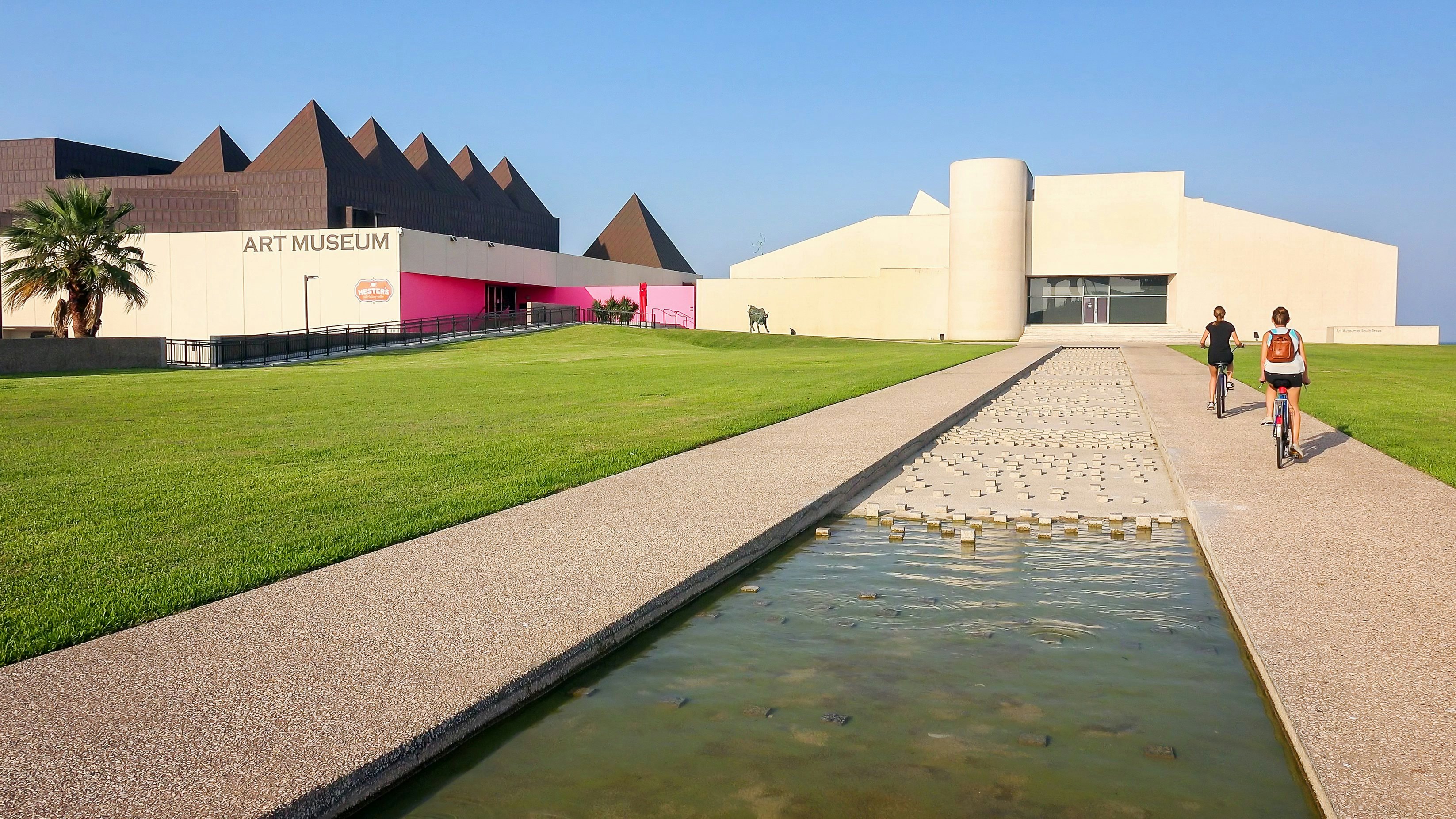 CORPUS CHRISTI, TEXAS - APRIL 17: Visitors approach the Art Museum of South Texas at Bayfront Science Park in Corpus Christi, Texas on April 17th, 2016.; Shutterstock ID 611247398; your: Bridget Brown; gl: 65050; netsuite: Online Editorial; full: POI Image Update