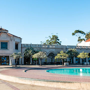 SAN DIEGO, CALIFORNIA - FEBRUARY 17, 2018: The Fleet Science Center, a science museum and planetarium, along with the historic Bea Evenson fountain, both located in Balboa Park, an urban city park.; Shutterstock ID 1027097284; your: Bridget Brown; gl: 65050; netsuite: Online Editorial; full: POI Image Update