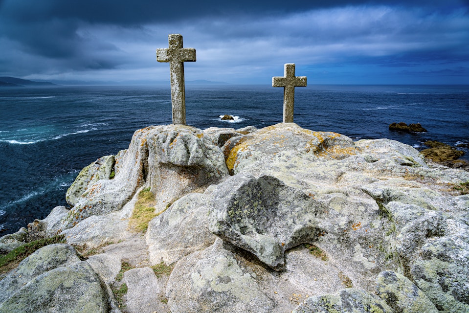 Crosses on the rocky cliffs of the Costa da Morte in northern Spain.
