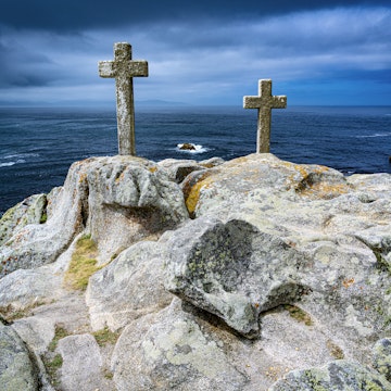 Crosses on the rocky cliffs of the Costa da Morte in northern Spain.