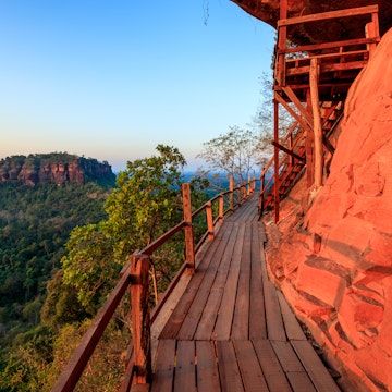 Cliff side wooden bridge at Wat Phu tok temple , Bueng Kan, Thailand