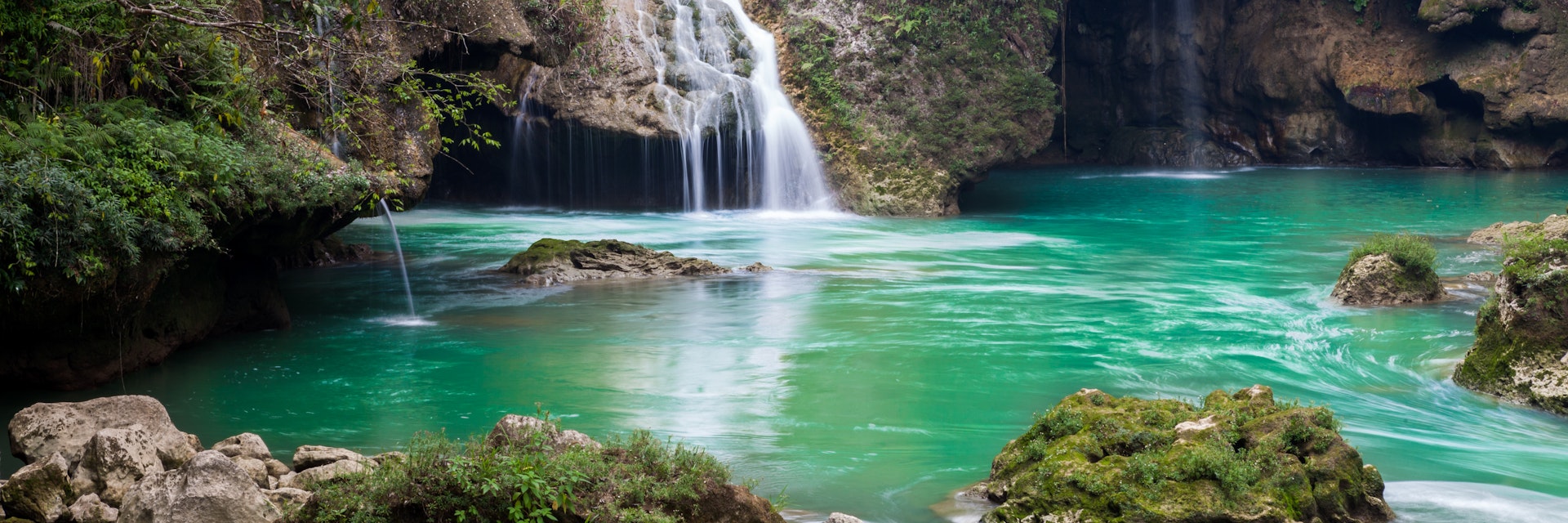 emerald pool and waterfall in gorgeous Semuc Champey national park