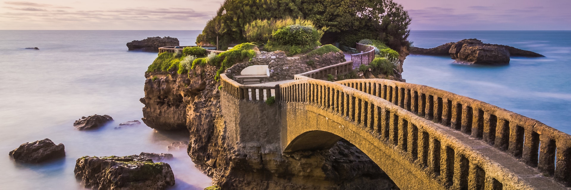 Bridge to the Rocher du Basta rock on the beach in Biarritz, France.