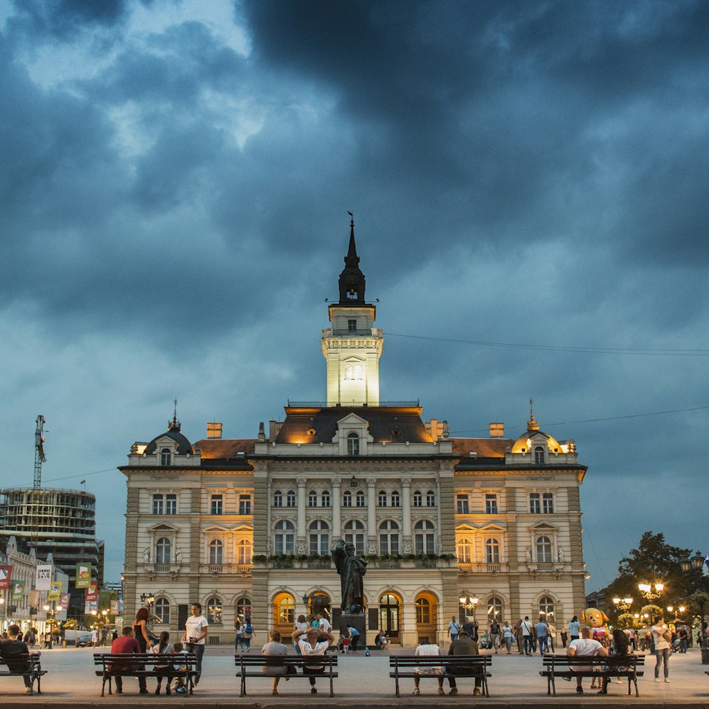 Novi Sad, Serbia - September 03, 2018: Evening at Novi Sad, with people passing by and sitting