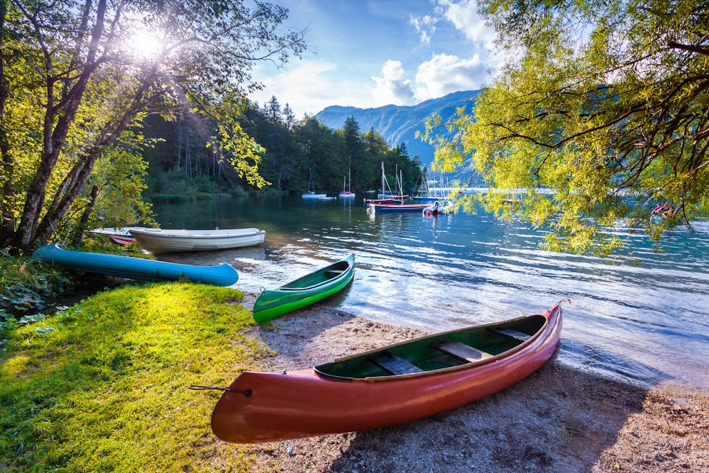 Bohinj Lake with boats, Triglav National Park, Julian Alps, Slovenia.