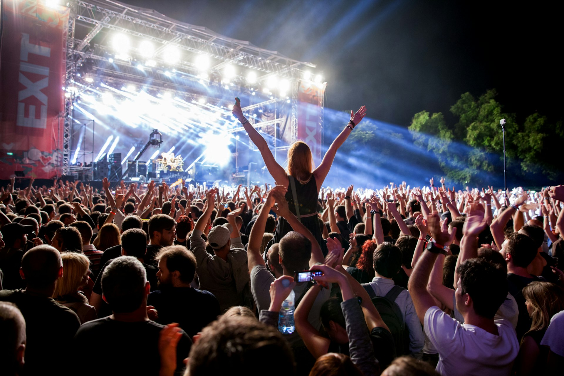 Crowd of revelers in front of the main stage at EXIT 2015 Music Festival during a set by heavy metal band Motorhead