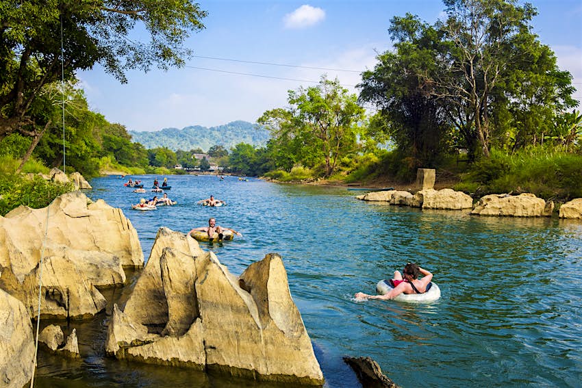 Tourists tubing down the Song River at Vang Vieng