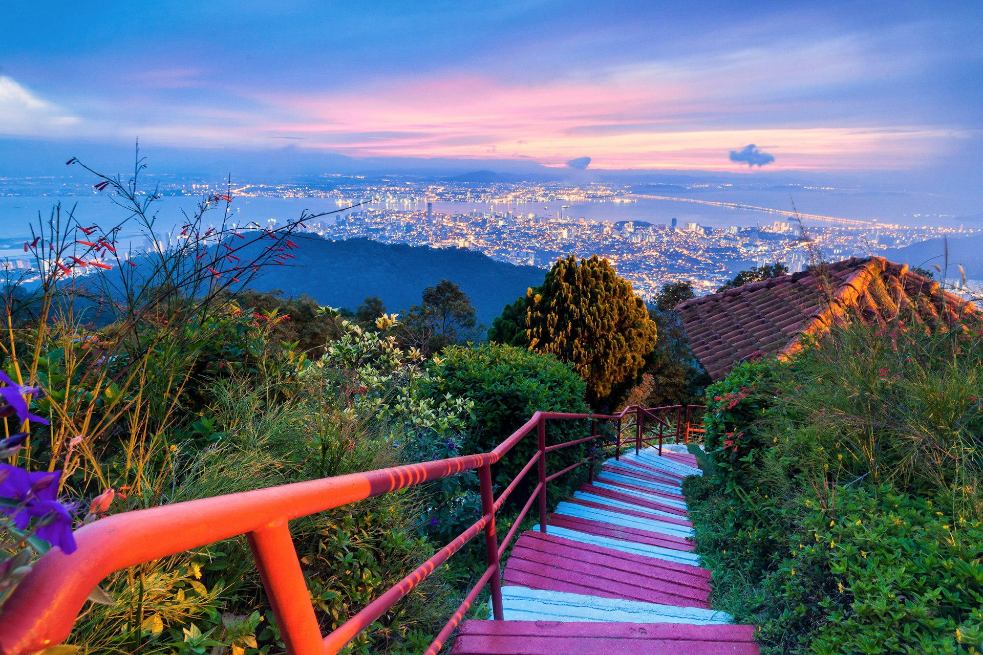 Staircase leading toward George Town city from Penang Hill at dawn