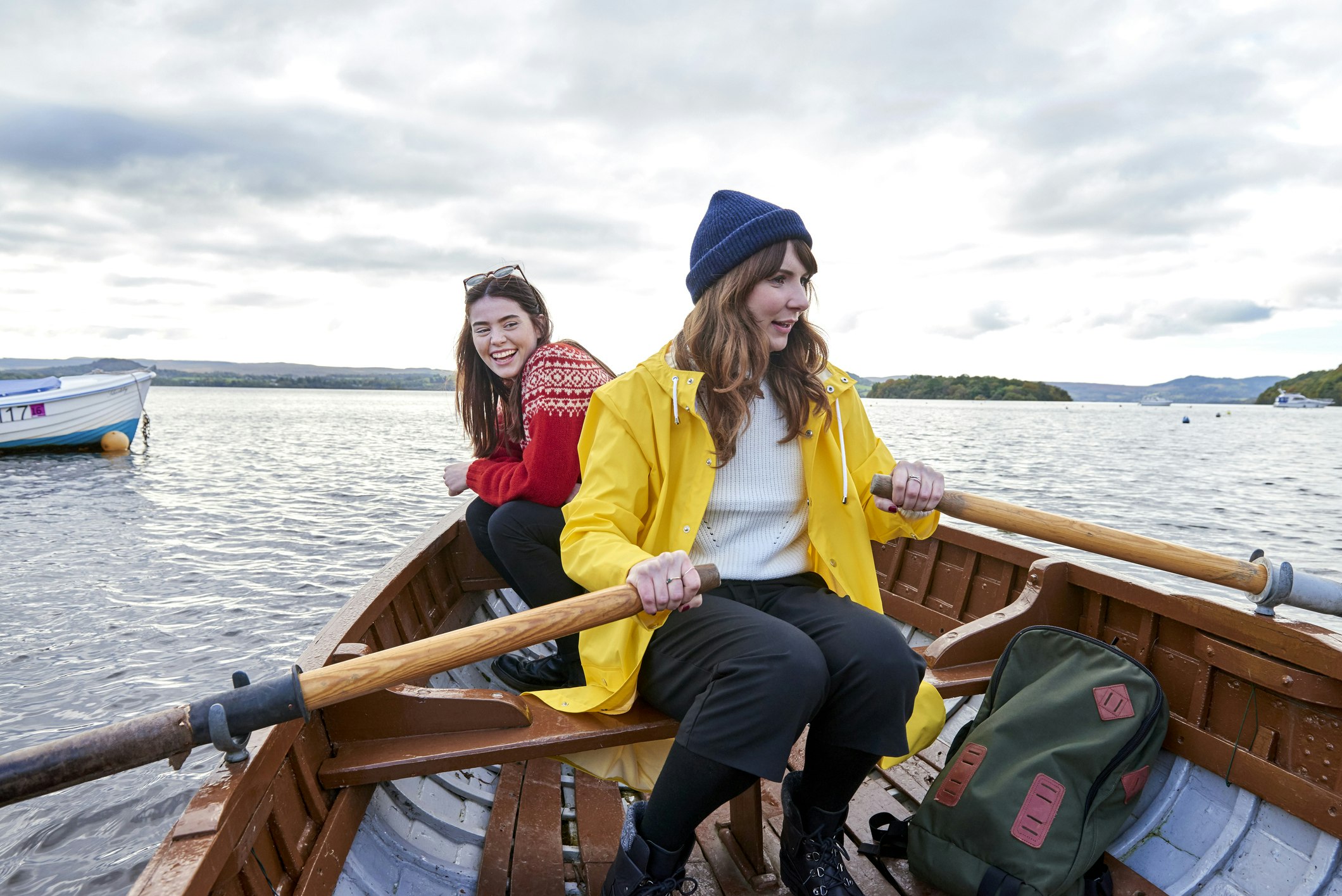 Two friends rowing in a boat - Scotland