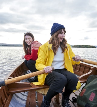 Two friends rowing in a boat - Scotland