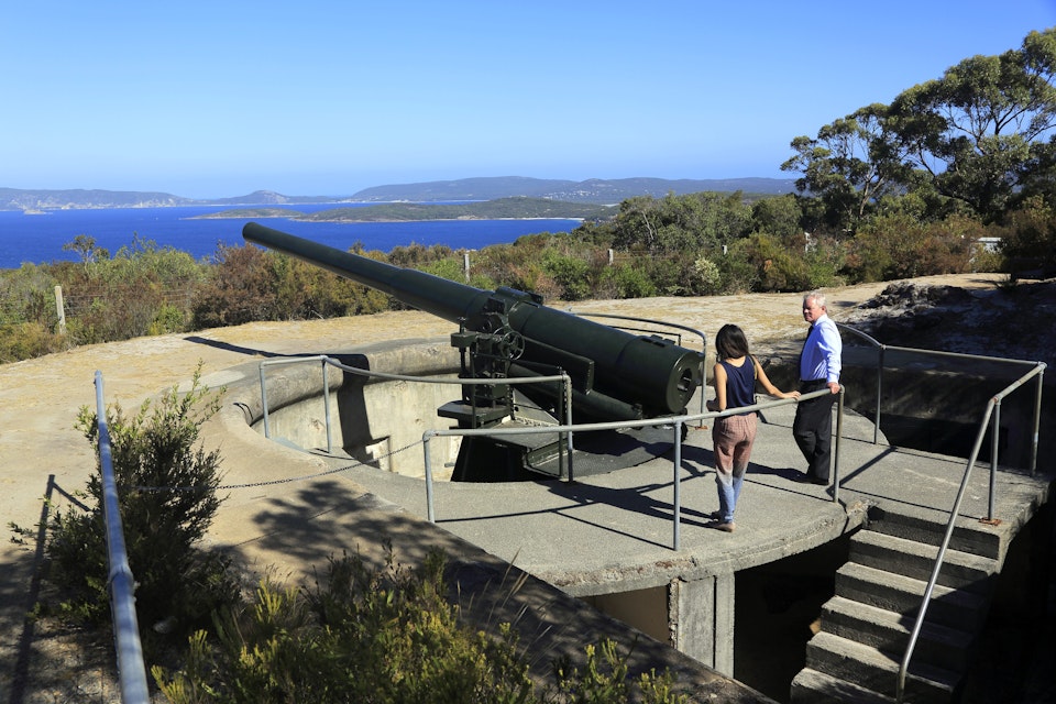 Coastal artillery gun with visitors at Princess Royal Fortress on the top of Mount Adelaide.