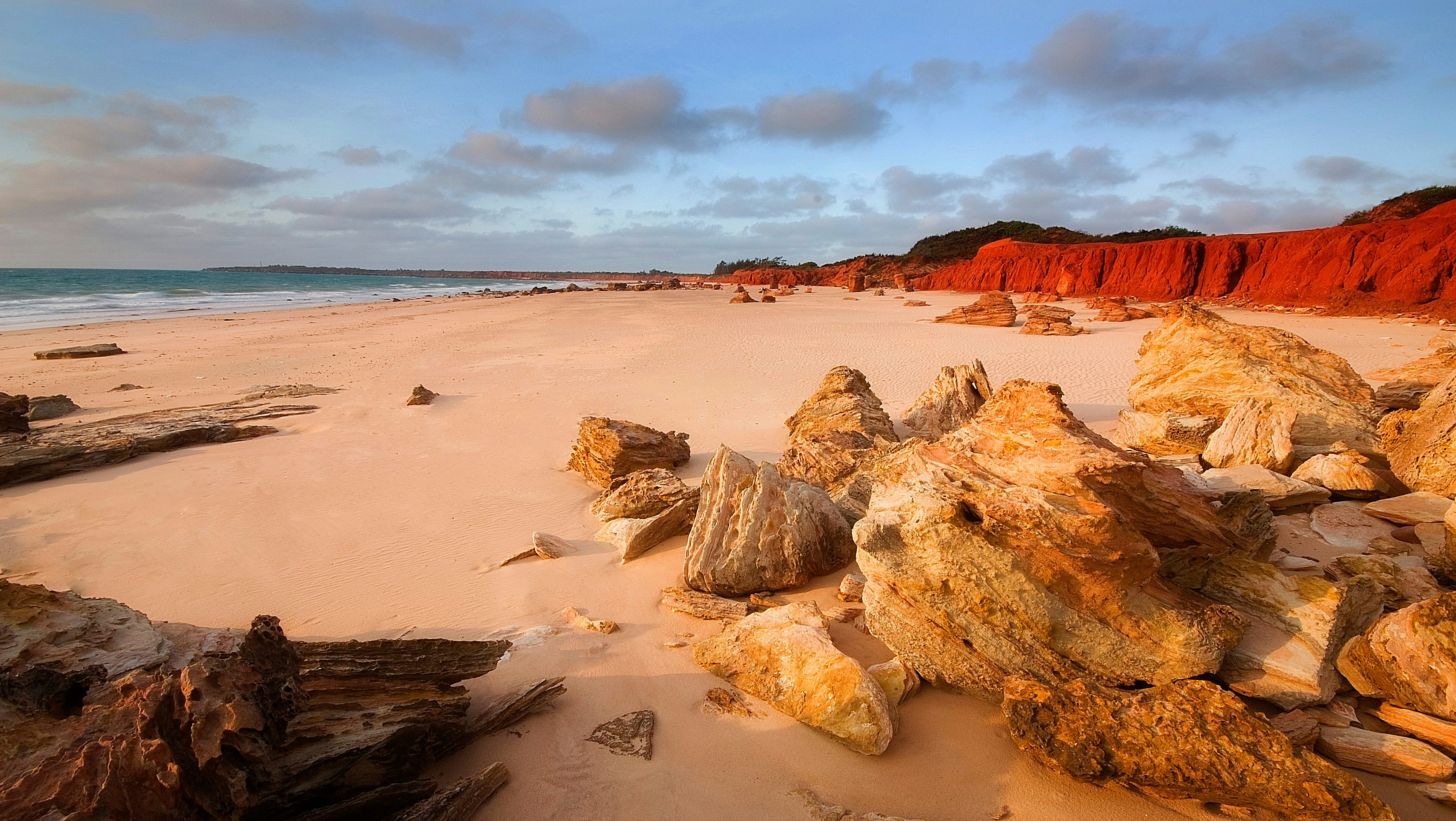 Reddell Beach Broome Australia
Sunset against the red pindan cliffs and sandstone rocks adds a dramatic contrast to this area.